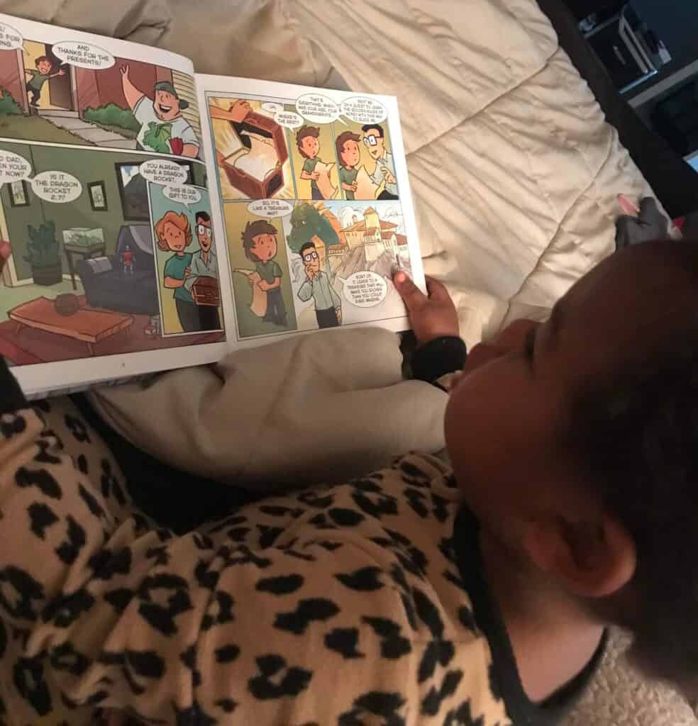 Child reading the Golden Quest